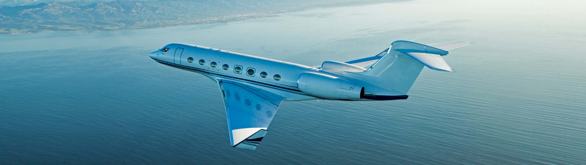 Gulfstream G450, business aircraft, flying over the Pacific Ocean off the west coast of the United States.