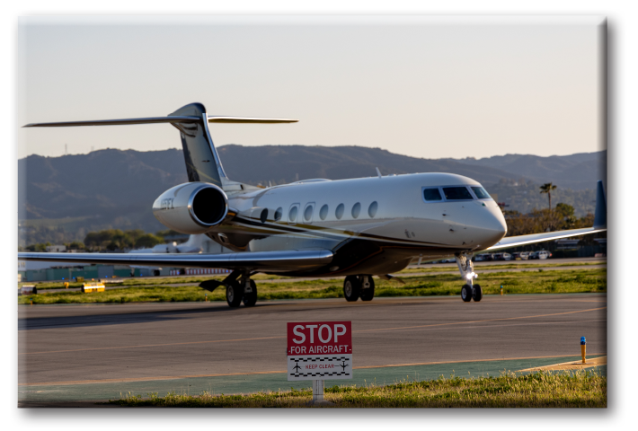 Corporate Wings, Gulfstream Private Jet preparing for takeoff.