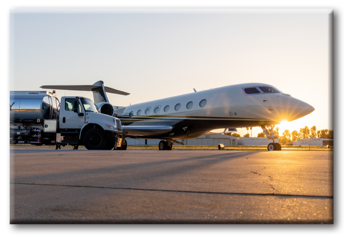 Corporate Wings, Gulfstream Private Jet being fueled on the tarmac.